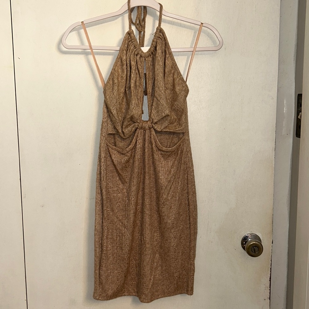 NWT beige dress with cutouts.